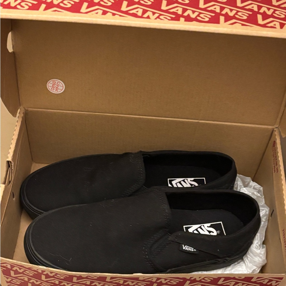 Vans Black Slip-On Flats with Classic Design